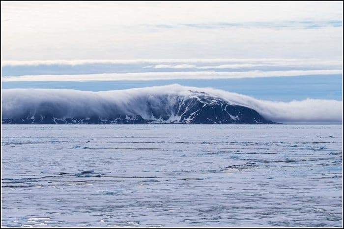Rolling mist at Vesle Taveoya (Seven Islands)
